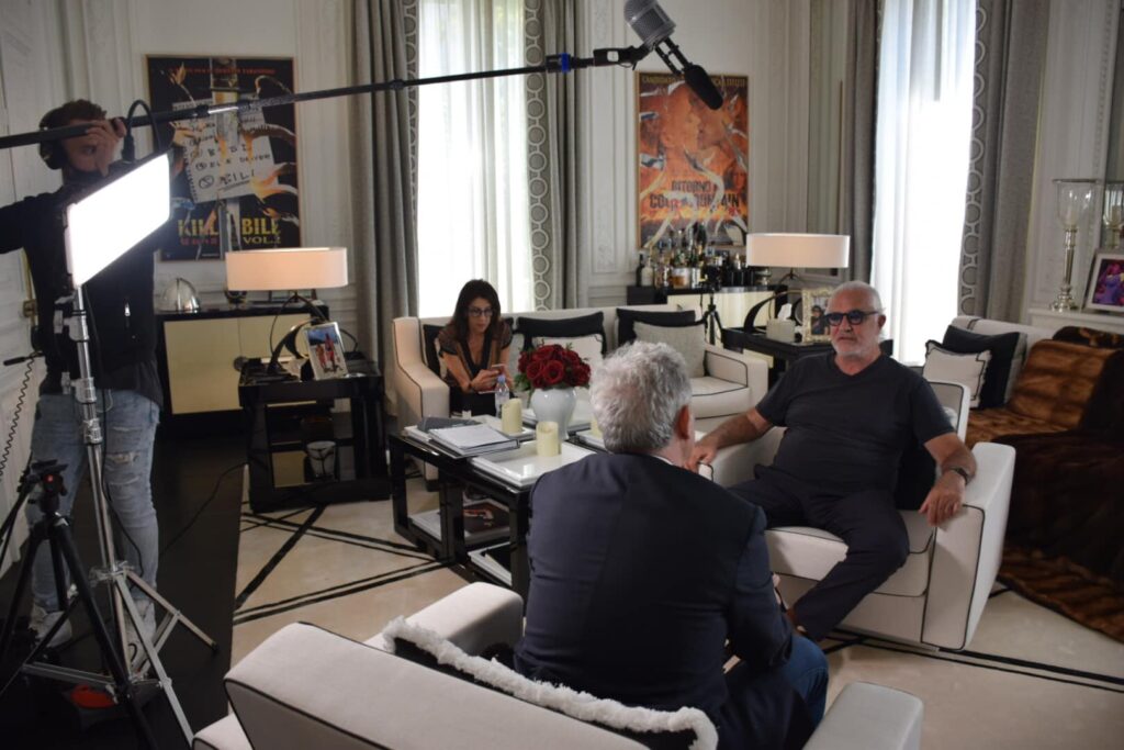 Sul set con Flavio Briatore